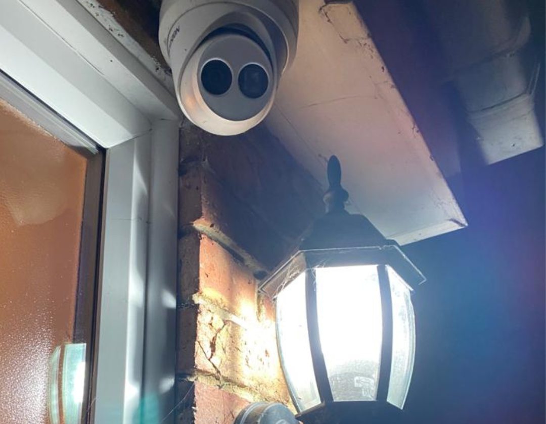CCTV camera installed by A Matter of Security above a front door